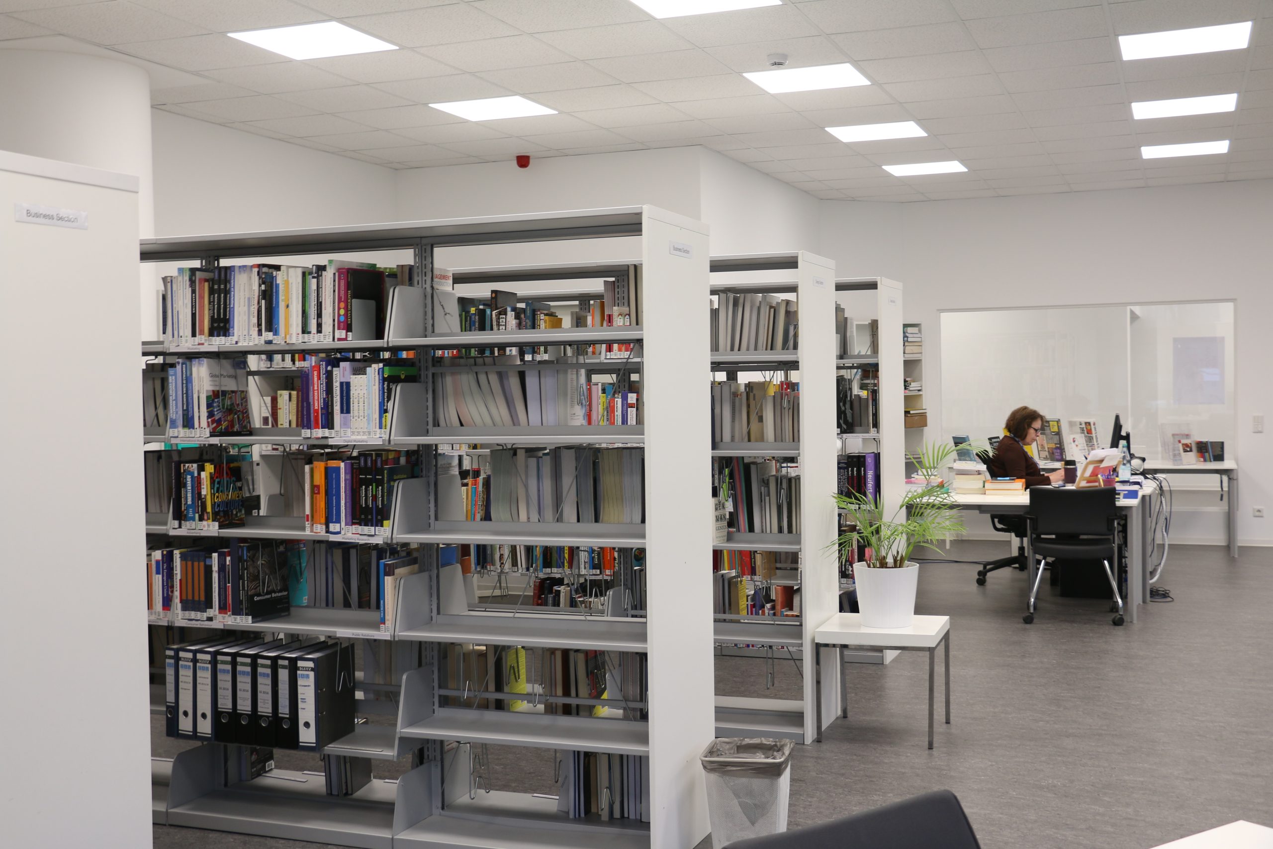 photo of library with shelves of books